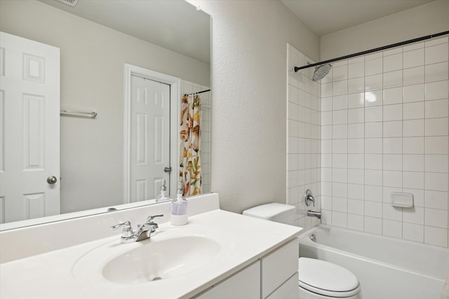 full bathroom with toilet, vanity, and shower / bath combo with shower curtain