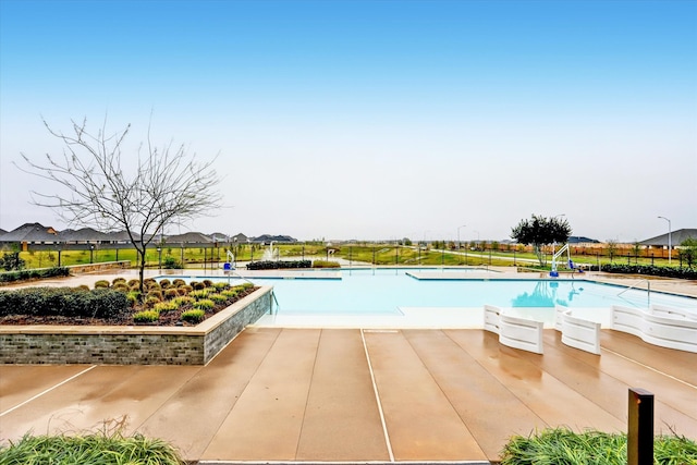 view of pool with a patio