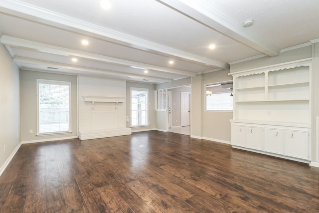 unfurnished living room with a brick fireplace, beamed ceiling, crown molding, and dark hardwood / wood-style flooring