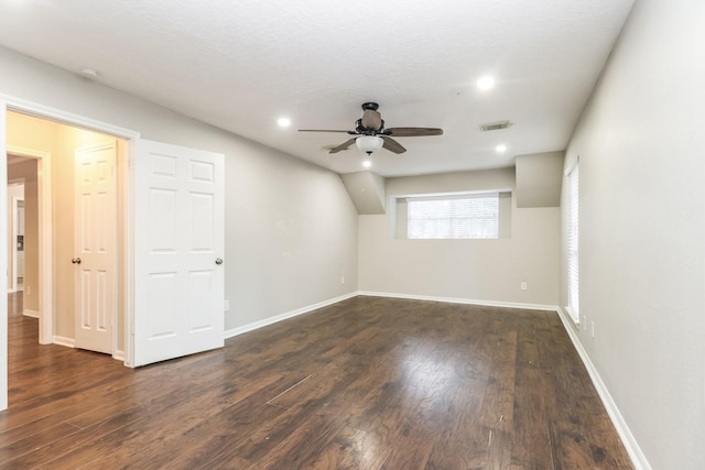 488 Stephen F Austin Dr, Conroe, TX 77302 - empty room with a ceiling fan, dark wood-type flooring, recessed lighting, and baseboards