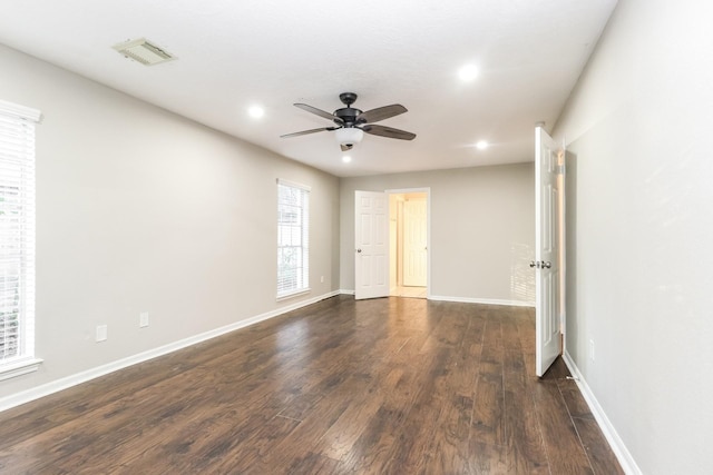 488 Stephen F Austin Dr, Conroe, TX 77302 - empty room featuring a ceiling fan, dark wood-type flooring, recessed lighting, and baseboards