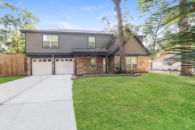 front facade featuring a garage and a front yard