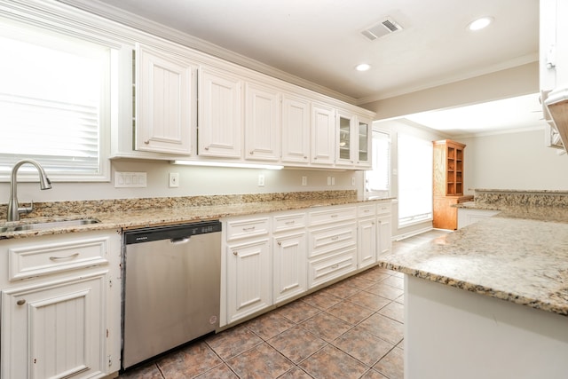 kitchen featuring sink, light stone counters, stainless steel dishwasher, crown molding, and white cabinets