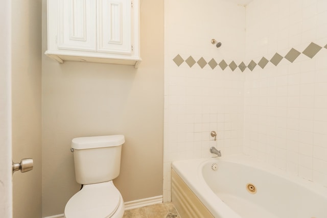 bathroom featuring tile patterned floors and toilet