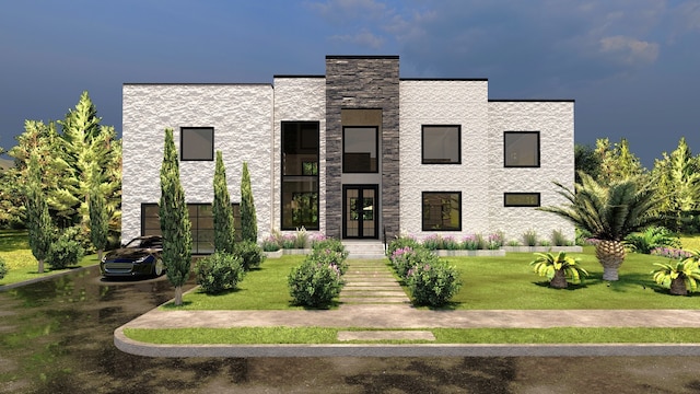 modern home with french doors and a front lawn