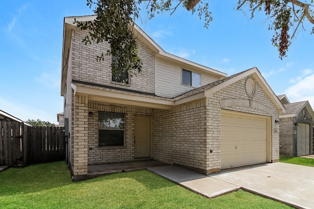 view of front of home with a garage and a front yard