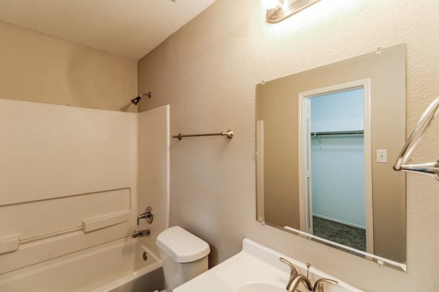 full bathroom with toilet, sink, and bathing tub / shower combination