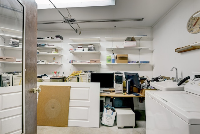 laundry room featuring sink and washer / clothes dryer