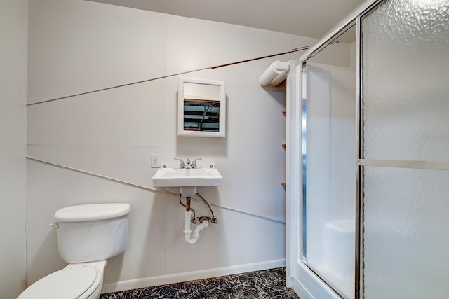 3215 County Road 160, Alvin, TX 77511 - bathroom with a stall shower, baseboards, and toilet