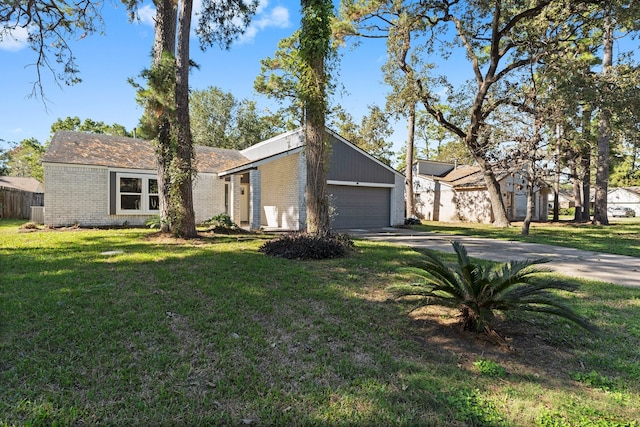 ranch-style home with a garage and a front lawn