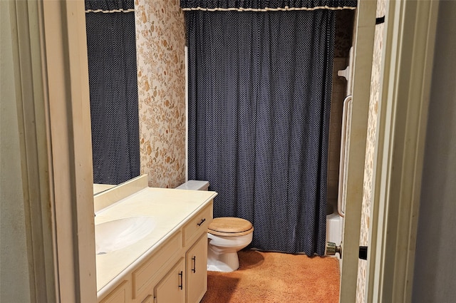 full bathroom featuring shower / tub combo, vanity, and toilet