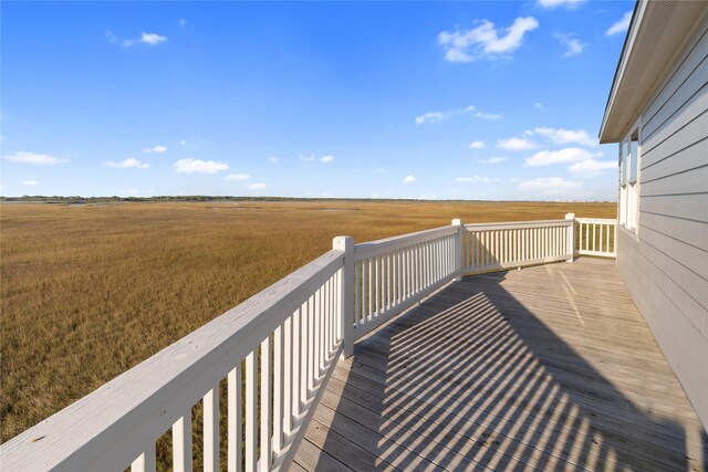 1286 Lagoon Dr, Crystal Beach, TX 77650 - wooden deck with a view of rural / pastoral area