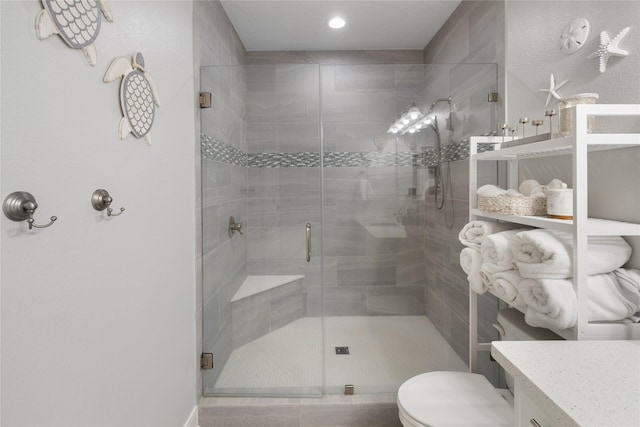1286 Lagoon Dr, Crystal Beach, TX 77650 - bathroom with toilet, a stall shower, vanity, and recessed lighting