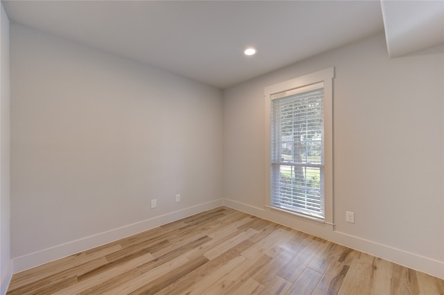 empty room with light wood-type flooring