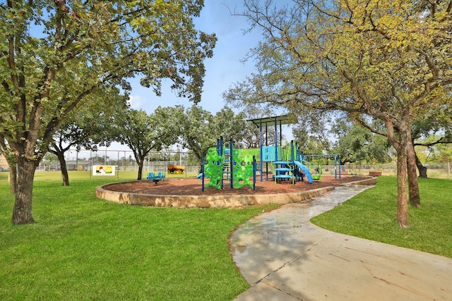 view of playground featuring a yard