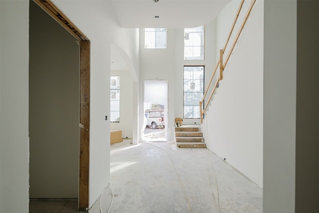 hallway with a towering ceiling