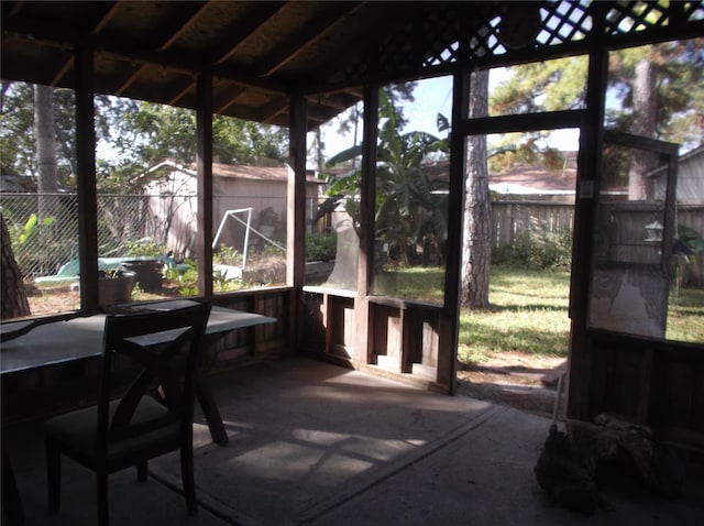 view of patio featuring a storage unit