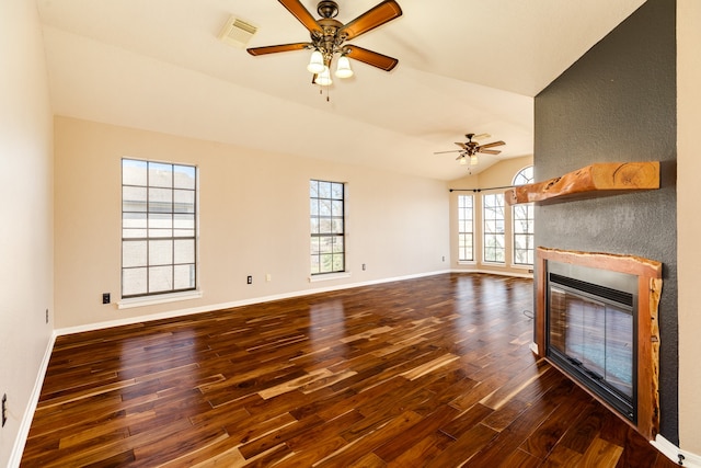 unfurnished living room with ceiling fan, wood-type flooring, and lofted ceiling