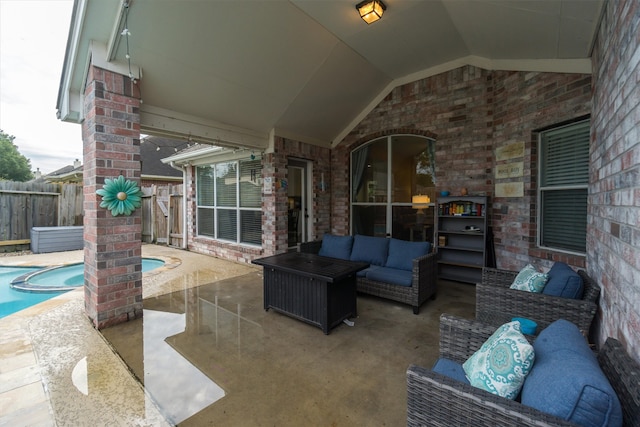 view of patio with a fenced in pool and an outdoor living space