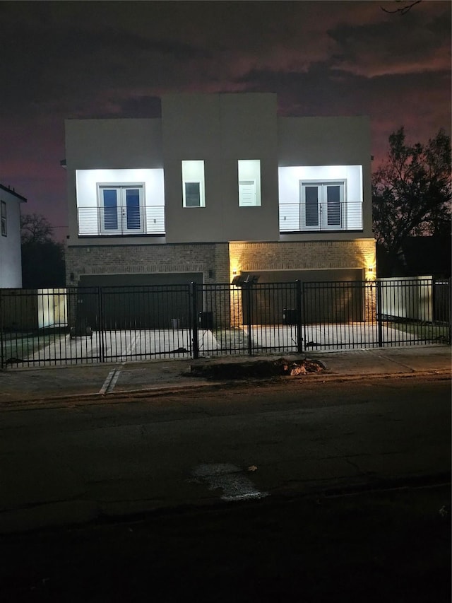 view of front of property featuring a garage