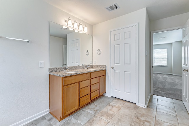 bathroom featuring vanity and tile patterned floors