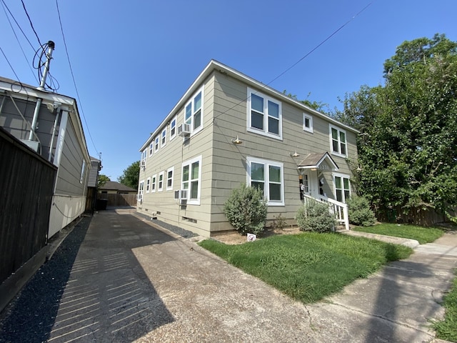 exterior space featuring a front lawn