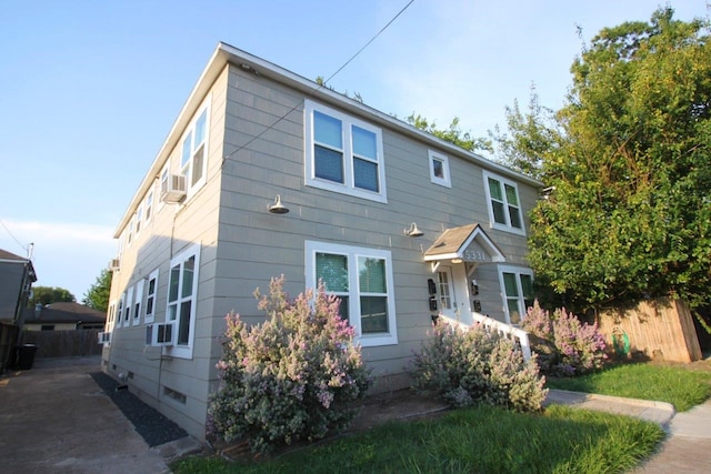 view of front of property with cooling unit