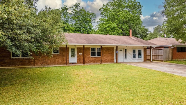 single story home with a front yard