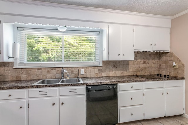 kitchen featuring white cabinetry, sink, black appliances, a textured ceiling, and decorative backsplash