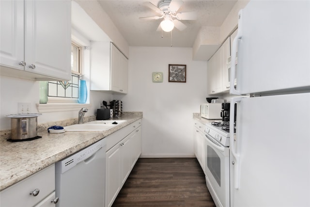 kitchen featuring sink, ceiling fan, white appliances, white cabinets, and dark hardwood / wood-style flooring