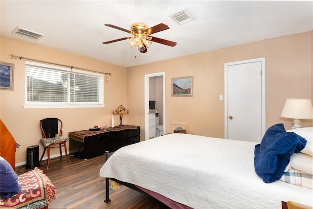 bedroom with ensuite bathroom, dark hardwood / wood-style flooring, and ceiling fan