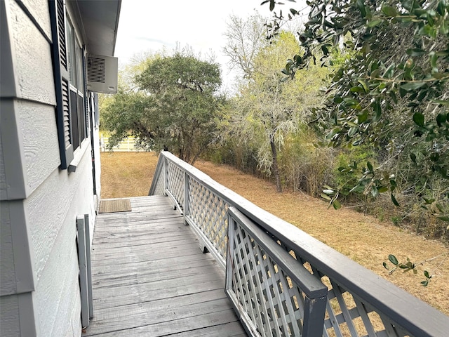 wooden balcony featuring a deck