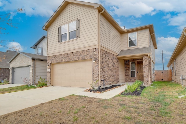 view of front of property featuring a garage