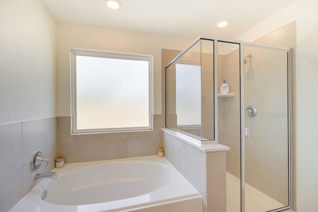 bathroom with independent shower and bath