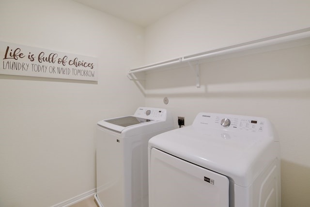 washroom with washer and clothes dryer