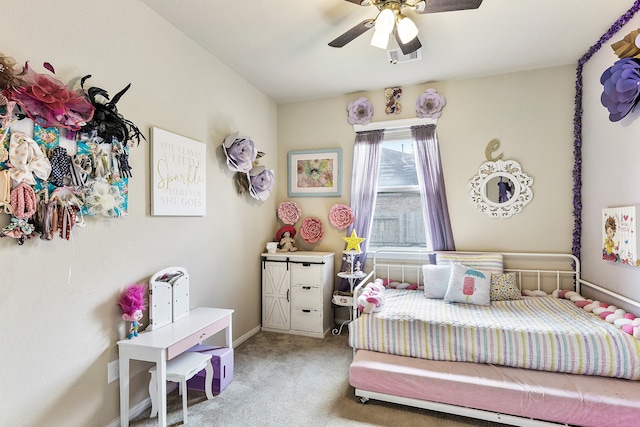 bedroom featuring ceiling fan and carpet floors