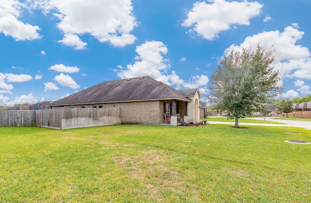 exterior space with a lawn