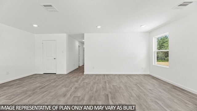 empty room featuring light hardwood / wood-style flooring