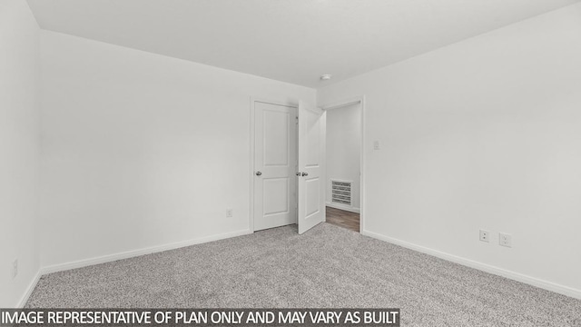 11938 Midas Ln, Willis, TX 77378 - carpeted spare room with baseboards