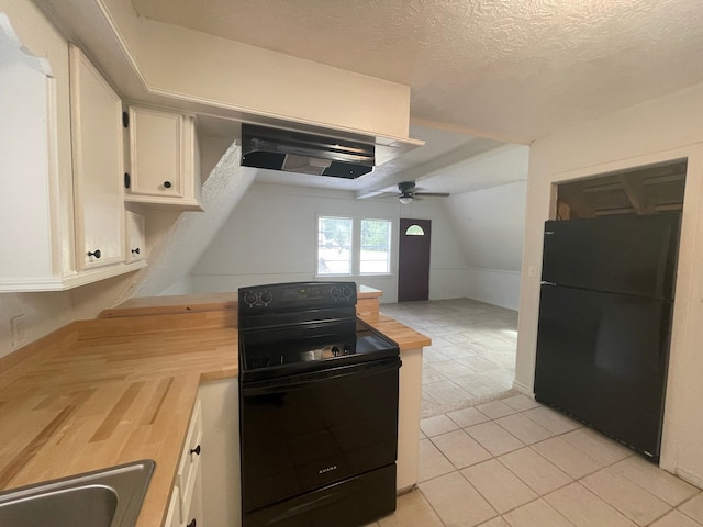 kitchen featuring butcher block counters, black appliances, a textured ceiling, extractor fan, and white cabinetry