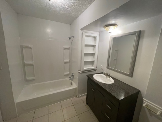 bathroom featuring shower / tub combination, vanity, a textured ceiling, and tile patterned flooring