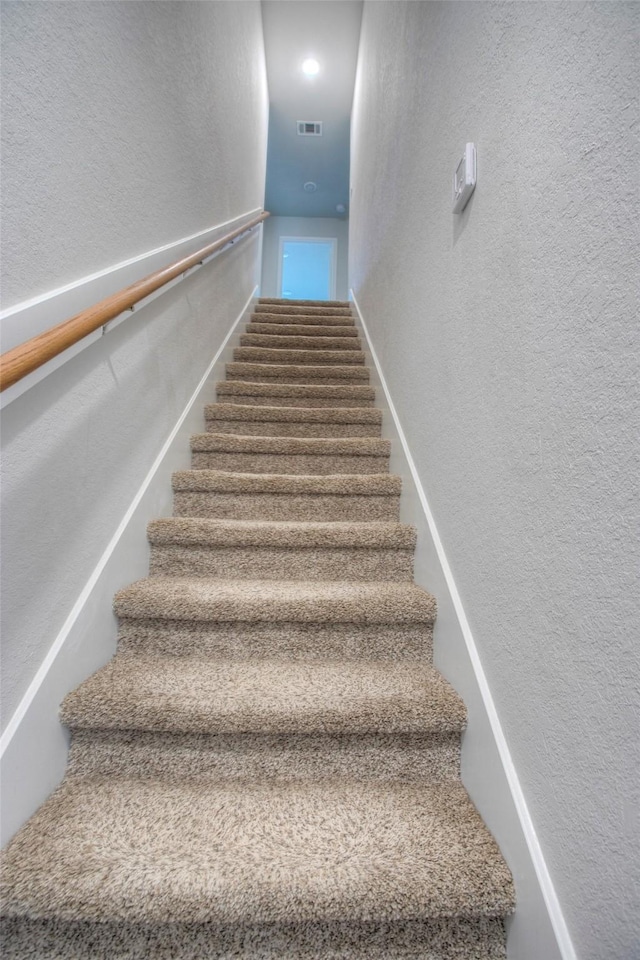 4 Big Lake Cir, Huntsville, TX 77320 - stairs featuring a textured wall