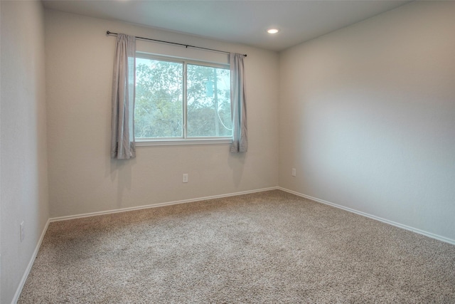 4 Big Lake Cir, Huntsville, TX 77320 - carpeted spare room featuring baseboards and recessed lighting