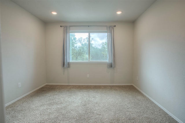 view of carpeted spare room