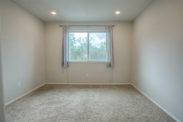 4 Big Lake Cir, Huntsville, TX 77320 - carpeted empty room with recessed lighting and baseboards