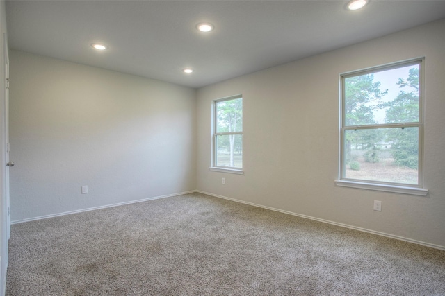 4 Big Lake Cir, Huntsville, TX 77320 - carpeted empty room with recessed lighting and baseboards