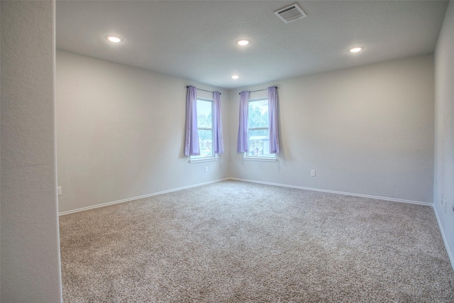 empty room with carpet floors