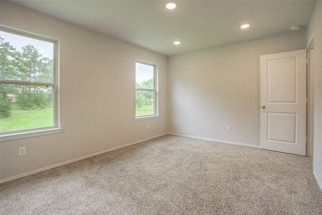 4 Big Lake Cir, Huntsville, TX 77320 - carpeted empty room with recessed lighting and baseboards