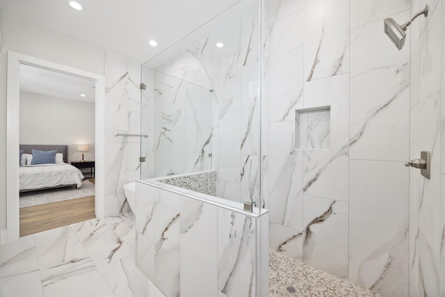 bathroom with tiled shower