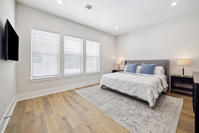 bedroom featuring light wood-type flooring